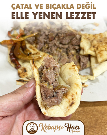 Denizli Kebab service with warm flatbread and onions